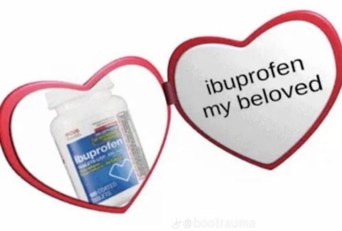 a heart-shaped locket with a bottle of Ibuprofen that reads'ibuprofen my beloved'
